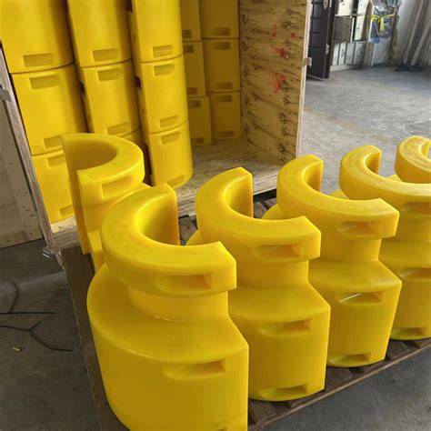 Assembled subsea bend restrictor string with end termination